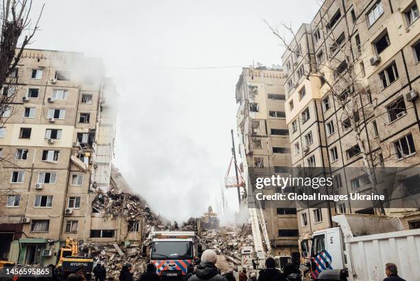 Residential building destroyed after a Russian missile attack on January 15, 2023 in Dnipro, Ukraine. Part of the building was completely destroyed...