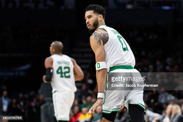 Jayson Tatum of the Boston Celtics reacts during their game against the Charlotte Hornets at Spectrum Center on January 14, 2023 in Charlotte, North...