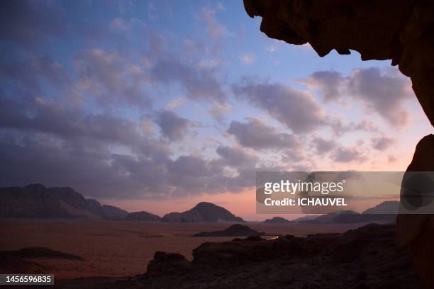 sunset on wadi rum desert jordan - middle east stock pictures, royalty-free photos & images