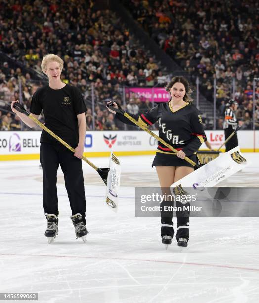 Members of the Knights Guard clean the ice during the Vegas Golden Knights' game against the Edmonton Oilers at T-Mobile Arena on January 14, 2023 in...