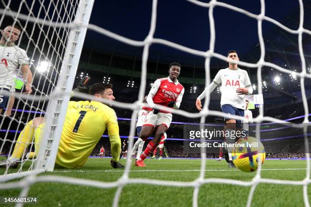 Hugo Lloris of Tottenham Hotspur reacts after scoring an own goal during the Premier League match between Tottenham Hotspur and Arsenal FC at...