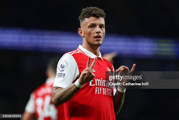 Ben White of Arsenal gestures the 0-2 scoreline to fans during the Premier League match between Tottenham Hotspur and Arsenal FC at Tottenham Hotspur...