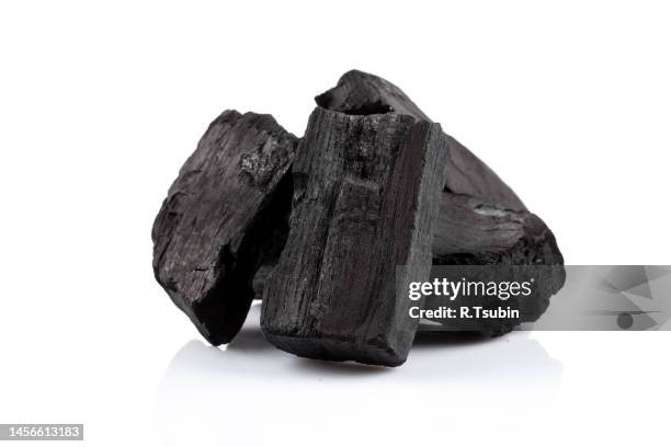 hardwood charcoal coal isolated on white background - steenkool stockfoto's en -beelden