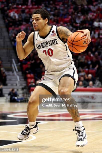 Matt Bradley of the San Diego State Aztecs dribbles the ball during the first half of a game against the New Mexico Lobos at Viejas Arena at San...