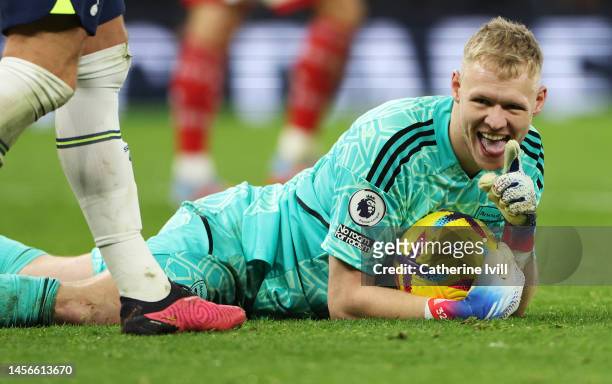 Aaron Ramsdale of Arsenal reacts after making a save during the Premier League match between Tottenham Hotspur and Arsenal FC at Tottenham Hotspur...
