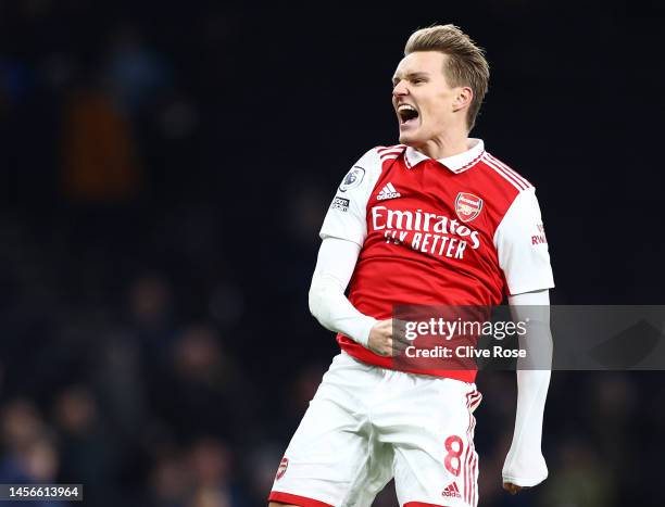 Martin Odegaard of Arsenal celebrates after the team's victory during the Premier League match between Tottenham Hotspur and Arsenal FC at Tottenham...