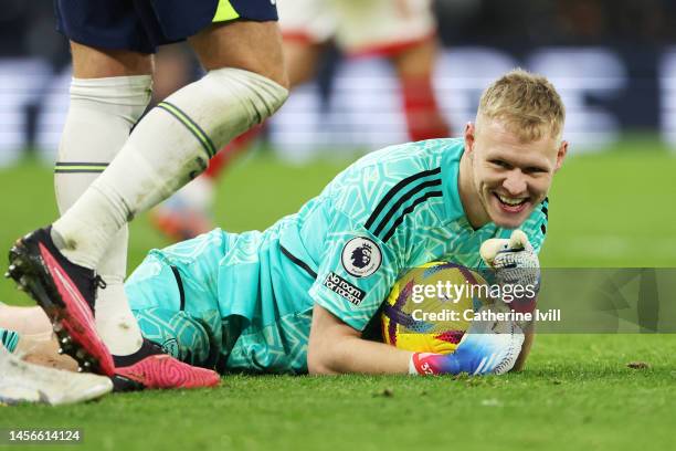 Aaron Ramsdale of Arsenal reacts after making a save during the Premier League match between Tottenham Hotspur and Arsenal FC at Tottenham Hotspur...