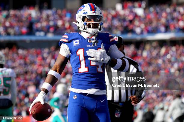 Stefon Diggs of the Buffalo Bills reacts after a reception against the Miami Dolphins during the first quarter of the game in the AFC Wild Card...