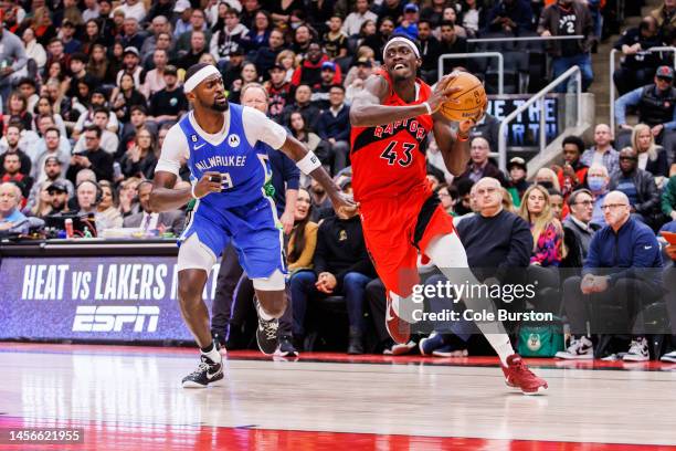 Pascal Siakam of the Toronto Raptors drives to the net against Bobby Portis of the Milwaukee Bucks during the first half of their NBA game at...