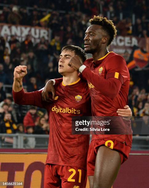 Paulo Dybala of AS Roma celebrates with teammate Tammy Abraham after scoring goal 1-0 during the Serie A match between AS Roma and ACF Fiorentina at...