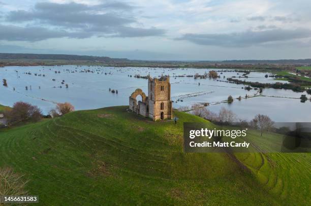 Flood water surrounds the Burrow Mump and the ruins of St Michael's Church on January 15, 2023 in Burrowbridge, England. While across the UK numerous...