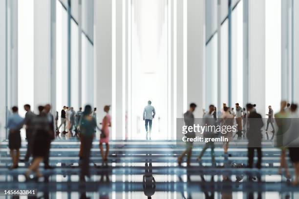 modern glass office lobby with business people - business finance and industry stock pictures, royalty-free photos & images