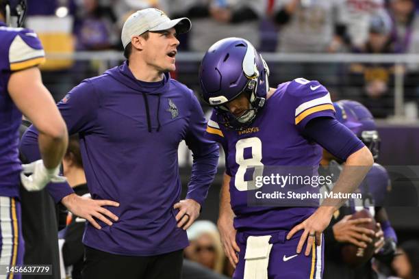 Kirk Cousins and head coach Kevin O'Connell of the Minnesota Vikings are seen prior to the NFC Wild Card playoff game against the New York Giants at...