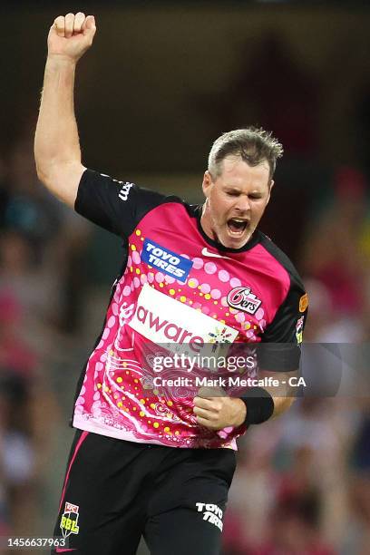 Dan Christian of the Sixers celebrates taking the wicket of Andrew Tye of the Scorchers during the Men's Big Bash League match between the Sydney...