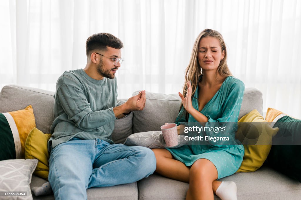 Shot of a young couple having an argument at home