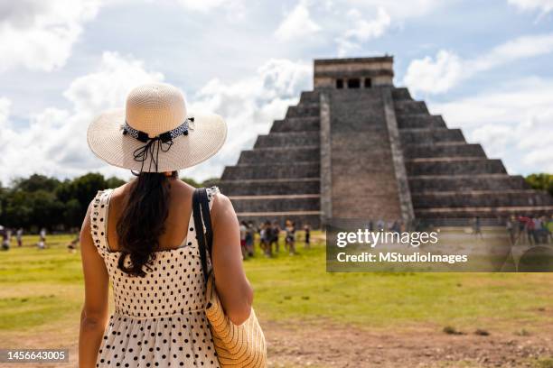 tourist visiting chichen itza pyramid in mexico - mayan stock pictures, royalty-free photos & images