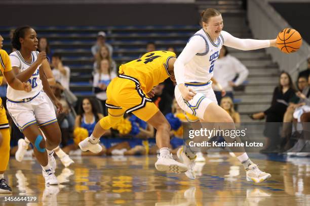 Lina Sontag of the UCLA Bruins steals the ball from Evelien Lutje Schipholt of the California Golden Bears at half court during the second half of a...