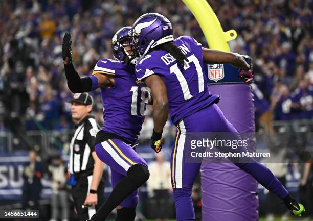 Osborn of the Minnesota Vikings celebrates with teammates after a touchdown during the second quarter against the New York Giants in the NFC Wild...