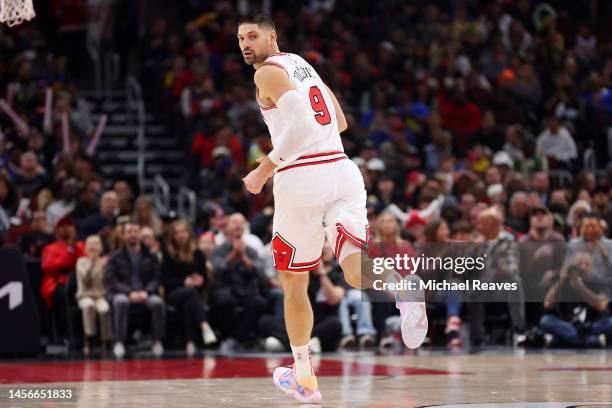 Nikola Vucevic of the Chicago Bulls reacts after a three pointer against the Golden State Warriors during the first half at United Center on January...