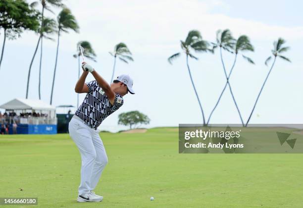 Si Woo Kim of South Korea plays a shot during the final round of the Sony Open in Hawaii at Waialae Country Club on January 15, 2023 in Honolulu,...