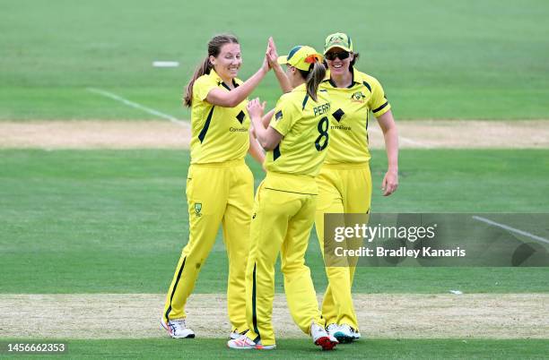 Darcie Brown of Australia celebrates with team mates after taking the wicket of Sidra Amin of Pakistan during game one of the Womens One Day...