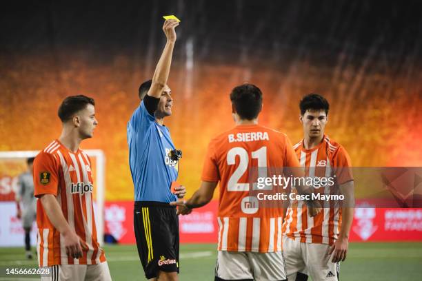 The referee shows a yellow card, during the third day of the Kings League at Cupra Arena on January 15, 2023 in Barcelona, Spain.