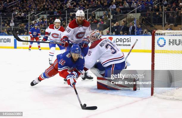 Vincent Trocheck of the New York Rangers is stopped by Sam Montembeault of the Montreal Canadiens at Madison Square Garden on January 15, 2023 in New...