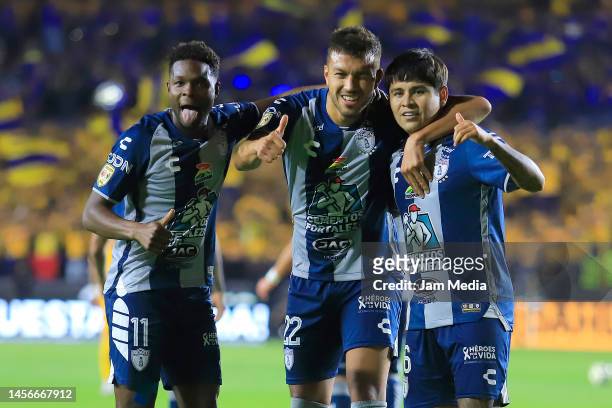 Javier Lopez of Pachuca celebrates with teammates Aviles Hurtado and Gustavo Cabral after scoring the team's first goal during the 2nd round match...