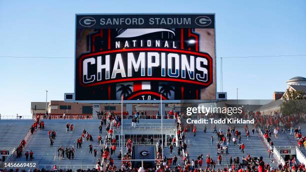 The Sanford Stadium video wall scoreboard displays a graphic of National Champions at the conclusion of the Georgia Bulldogs national championship...