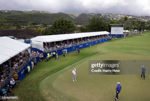 Hayden Buckley of the United States reacts to his missed putt on the 18th green during the final round of the Sony Open in Hawaii at Waialae Country...