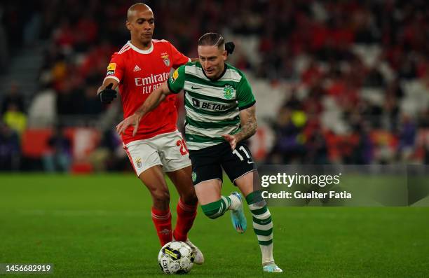 Nuno Santos of Sporting CP with Joao Mario of SL Benfica in action during the Liga Portugal Bwin match between SL Benfica and Sporting CP at Estadio...