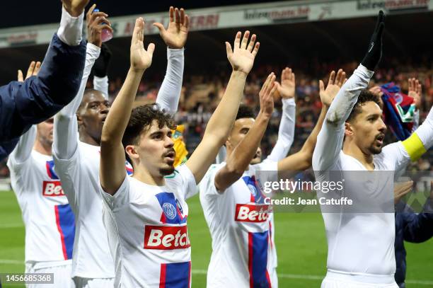 Vitinha, Marquinhos of PSG salute the supporters following the French Cup football match between La Berrichonne de Chateauroux and Paris...