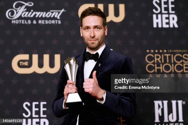 Paul Rogers, winner for the Best Editing award for "Everything Everywhere All at Once", poses in the press room during the 28th Annual Critics Choice...