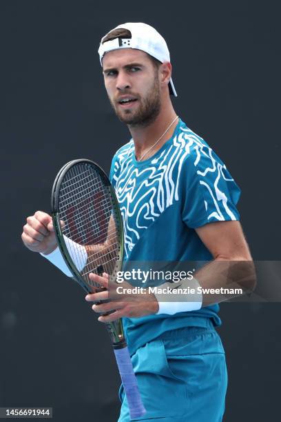 Karen Khachanov reacts in their round one singles match against Bernabe Zapata Miralles of Brazil during day one of the 2023 Australian Open at...
