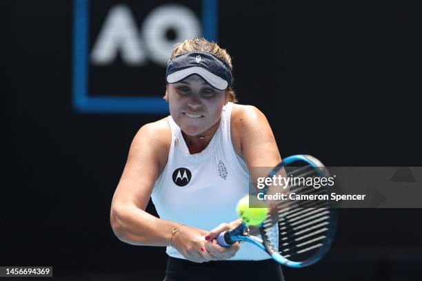 Sofia Kenin of the United States plays a backhand in their round one singles match against Victoria Azarenka during day one of the 2023 Australian...