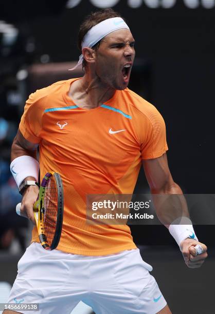 Rafael Nadal of Spain reacts in their round one singles match against Jack Draper of Great Britain during day one of the 2023 Australian Open at...