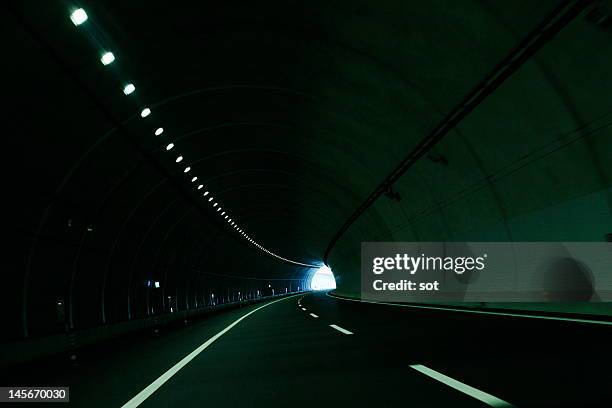 tunnel of expressway - light at the end of the tunnel stock pictures, royalty-free photos & images