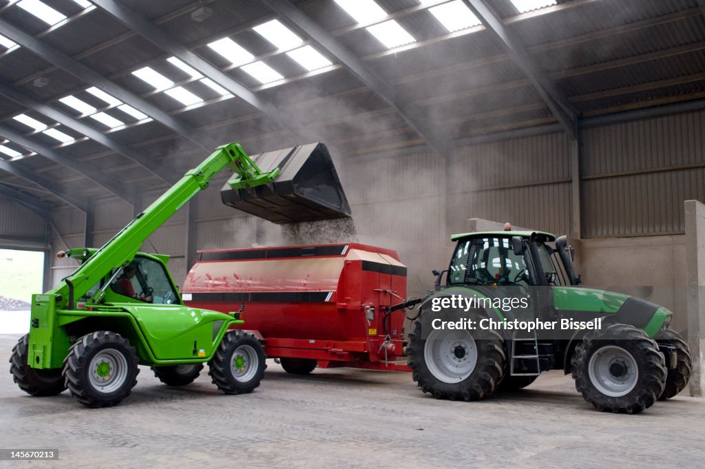 Loading Grain Into Mixer