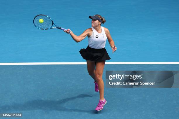 Sofia Kenin of the United States plays a forehand in their round one singles match against Victoria Azarenka during day one of the 2023 Australian...