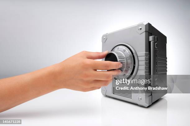 hand opening safe - combination lock stock pictures, royalty-free photos & images