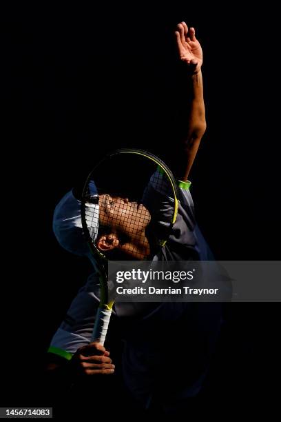 Jason Kubler of Australia serves in their round one singles match against Sebastian Baez of Argentina during day one of the 2023 Australian Open at...