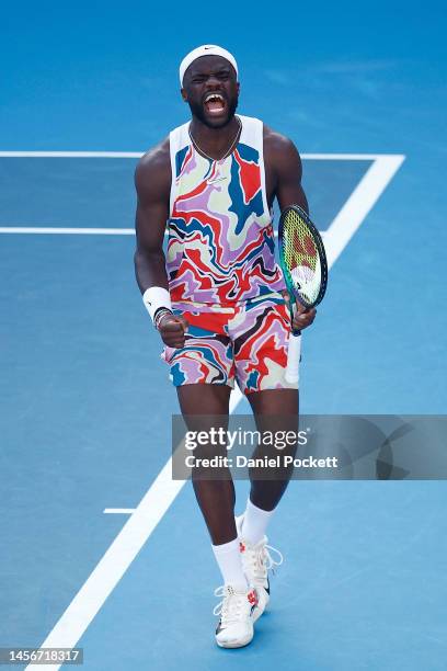 Frances Tiafoe of the United States celebrates after winning a point in their round one singles match against Daniel Altmaier of Germany during day...