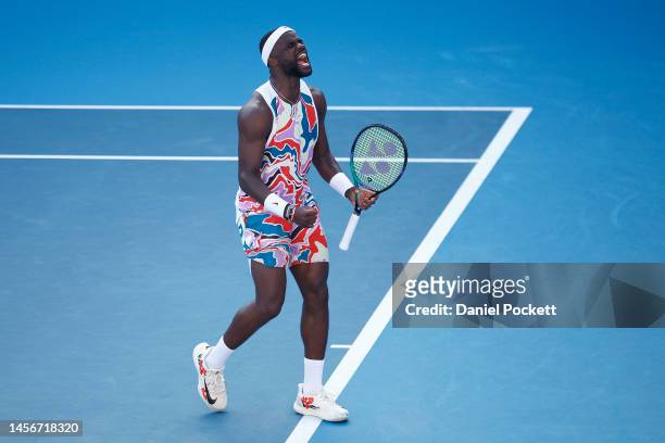 Frances Tiafoe of the United States celebrates after winning a point in their round one singles match against Daniel Altmaier of Germany during day...