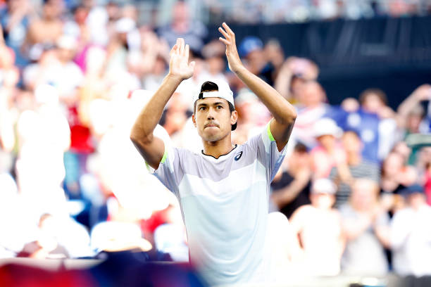 Jason Kubler of Australia celebrates after winning a point in their round one singles match against Sebastian Baez of Argentina during day one of the...
