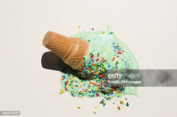 fallen ice cream cone - ice cream sprinkles stock pictures, royalty-free photos & images