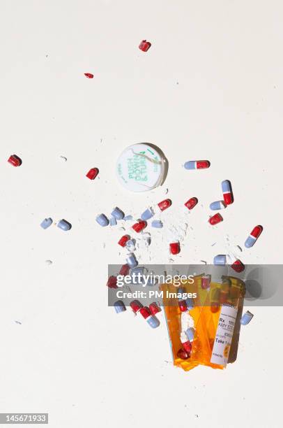 smashed bottle of prescription meds - broken bottle stock pictures, royalty-free photos & images