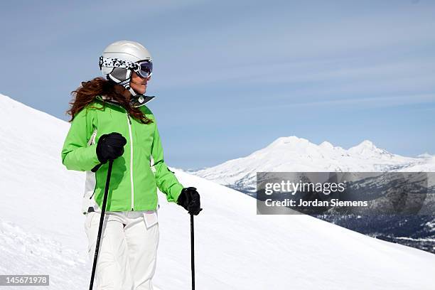 a female skiing. - mt bachelor stock pictures, royalty-free photos & images