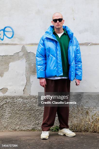 Guest is seen wearing a blue puffer down jacket outside the Etro show during the Milan Menswear Fall/Winter 2023/2024 on January 15, 2023 in Milan,...