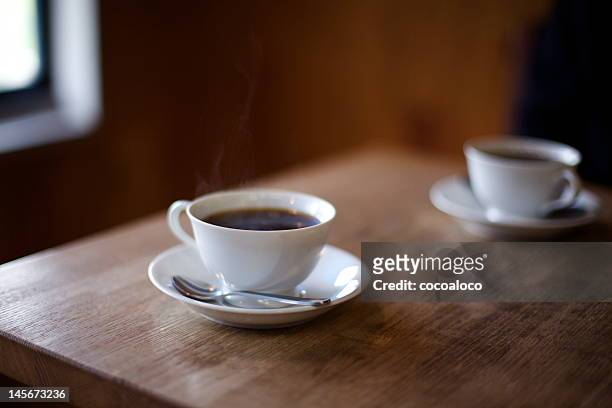 two cups of coffee - cup on the table stock pictures, royalty-free photos & images