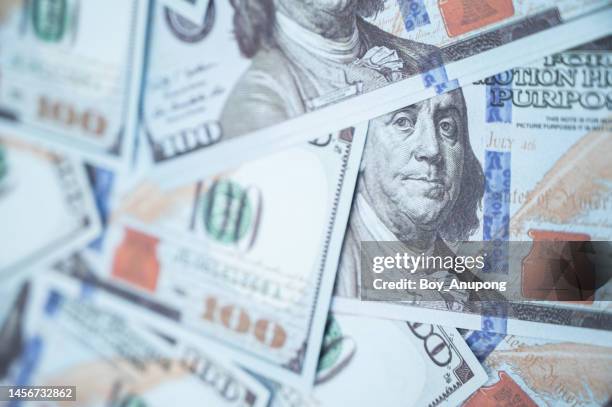 full frame shot of one hundred dollars banknotes used as background. - american one hundred dollar bill stockfoto's en -beelden